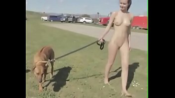 Naked girl with her pet dog